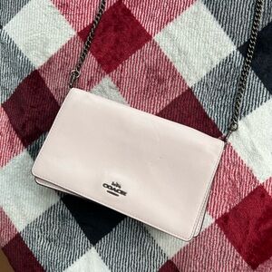Coach purse, soft pink color with fun chain purse strap.